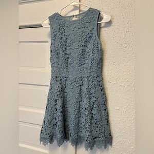 Powder blue lace dress. Open back with cute detailing.